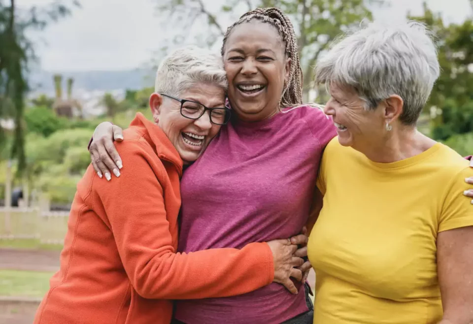 Group of older woman hugging