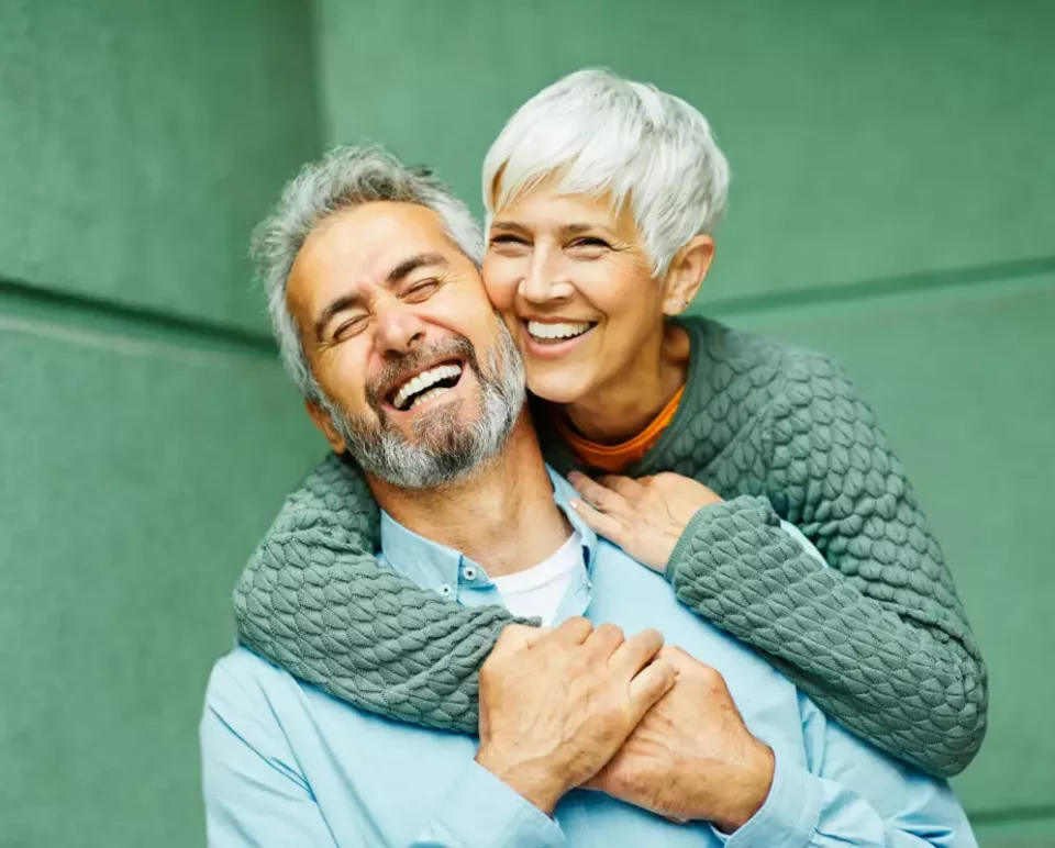 Active couple hugging